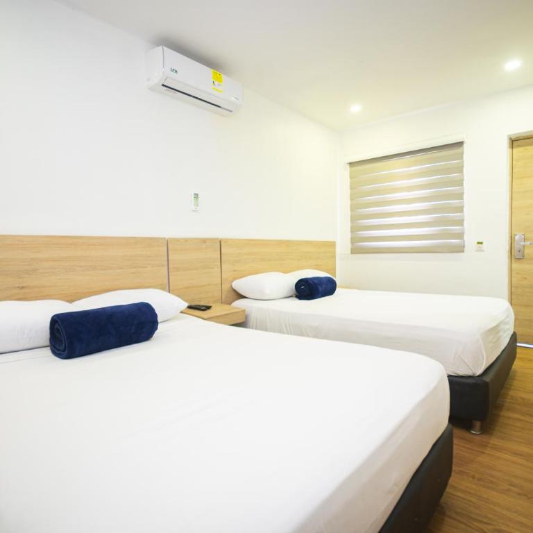 Hotel Poma Rosa Boutique Laureles - Habitación Doble - 2 camas dobles - 2