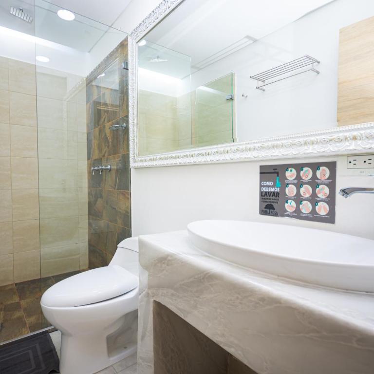 Hotel Poma Rosa Boutique Laureles - Habitación Deluxe con cama extragrande y patio - 8