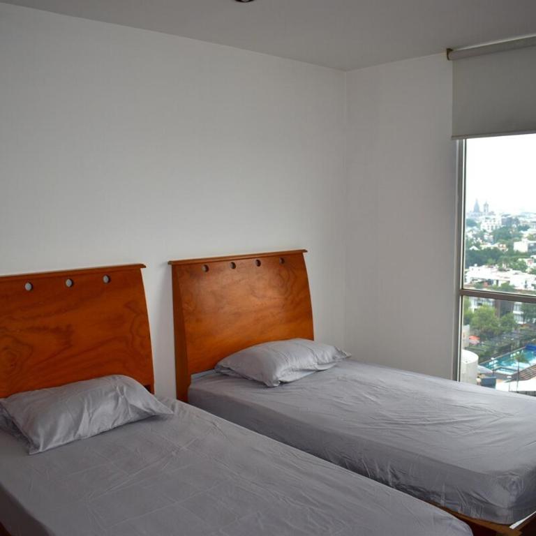 Departamento Comodo y Panoramico en Colonia Americana - Three-Bedroom Apartment - 12