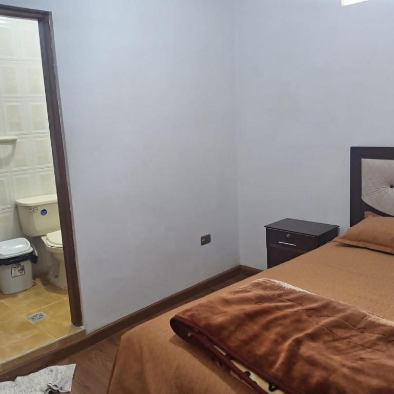 Alojamiento Uyuja en Centro - Habitación Individual con baño - 8