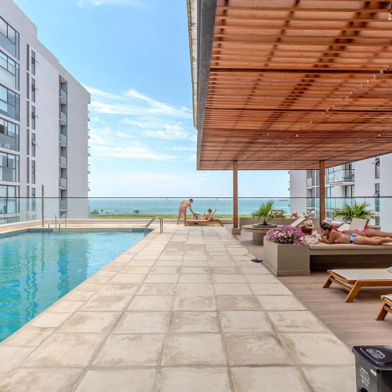 Apto Moderno con Balcon Vista al Mar y Piscina - Apartamento de 1 dormitorio - 9