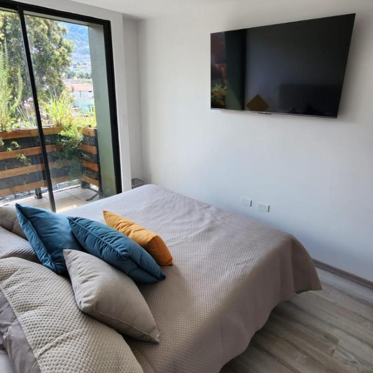Suite 2 cuadras Universidad Central - Apartamento de 1 dormitorio - 1
