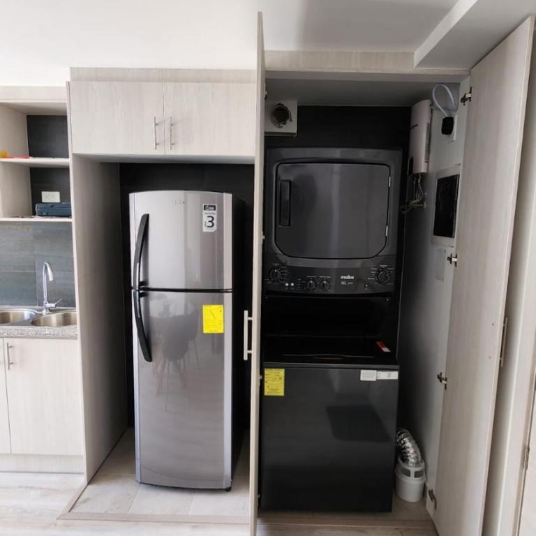 Suite 2 cuadras Universidad Central - Apartamento de 1 dormitorio - 13