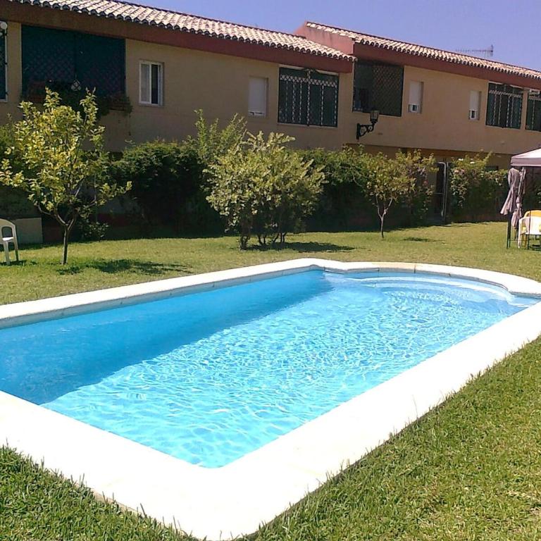 Adosada con vistas al mar y piscina comunitaria - Apartamento de 3 dormitorios - 29