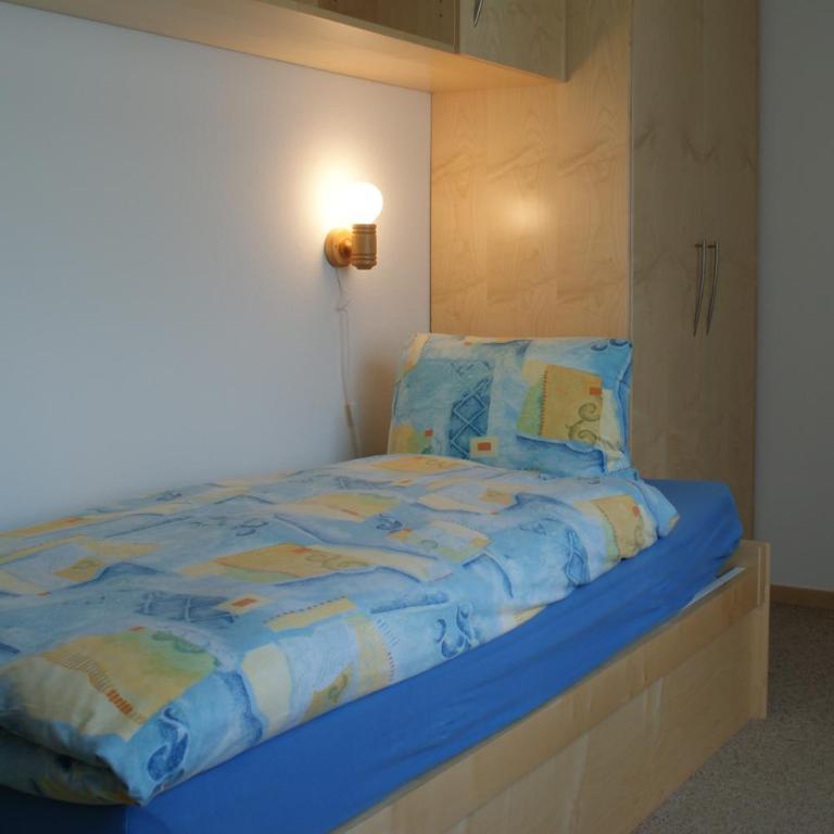 4 Zi Familienwohnung Haus Ravaisch 24 im 2ten OG Davos Dorf - Apartment mit 3 Schlafzimmern und Balkon - 9
