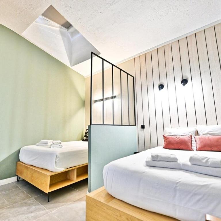Stylish 2-Bedroom Loft in the Heart of Paris with Air Conditioning - Appartement - 32