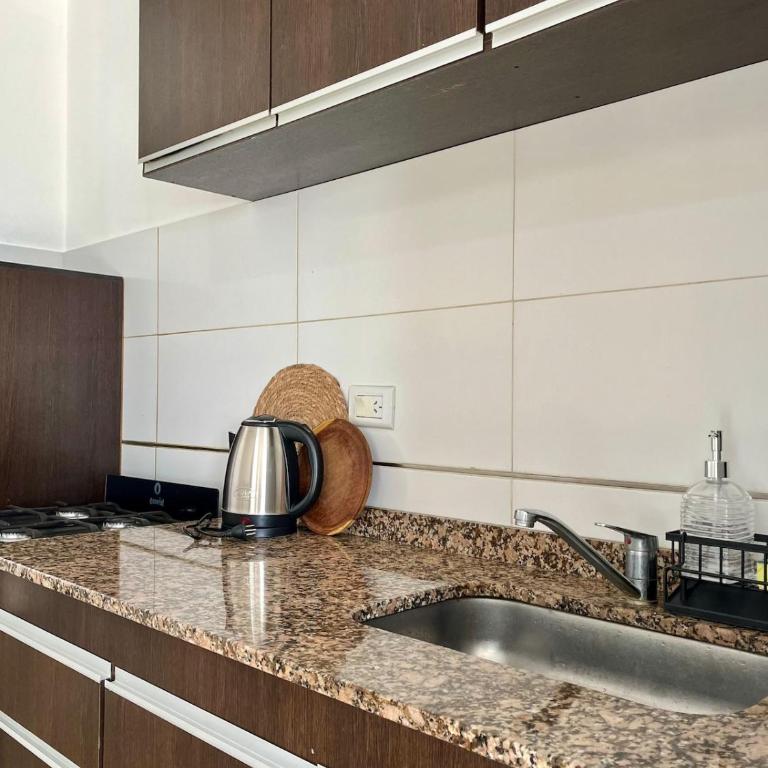 Moderno departamento con cochera privada - Apartamento de 1 dormitorio con jardín - 11