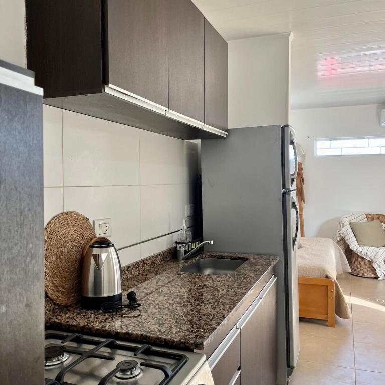 Moderno departamento con cochera privada - Apartamento de 1 dormitorio con jardín - 14