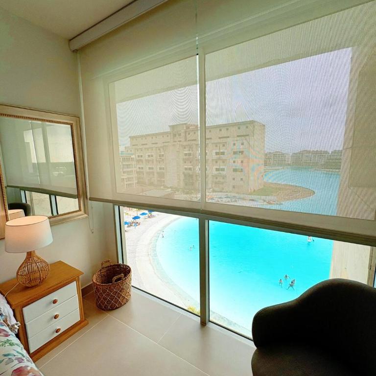 Tu café de la mañana con vista a la laguna - Two-Bedroom Apartment - 5