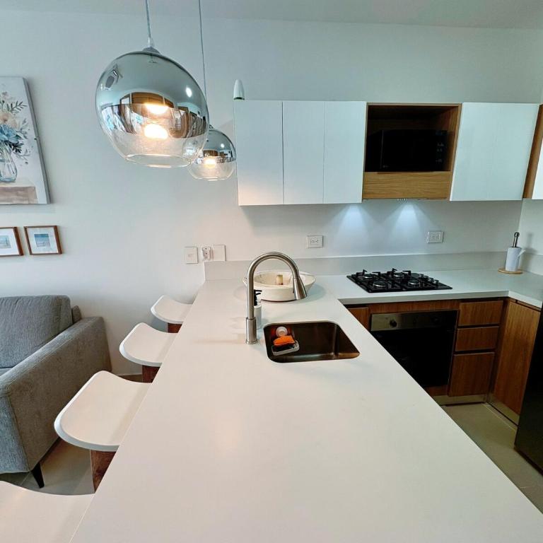 Tu café de la mañana con vista a la laguna - Two-Bedroom Apartment - 13