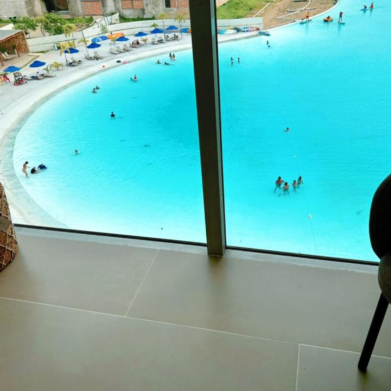 Tu café de la mañana con vista a la laguna - Two-Bedroom Apartment - 18