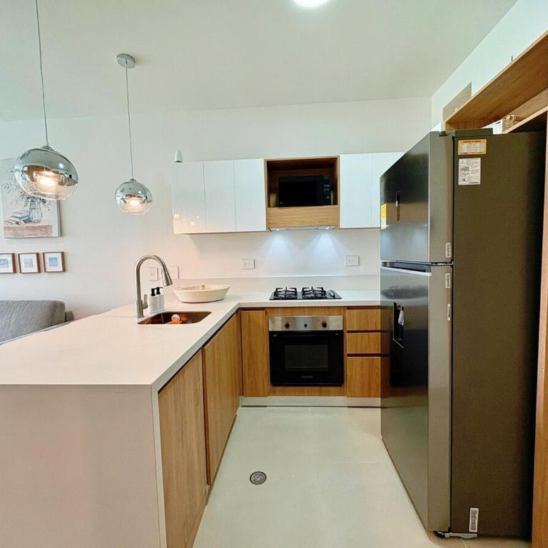 Tu café de la mañana con vista a la laguna - Two-Bedroom Apartment - 19