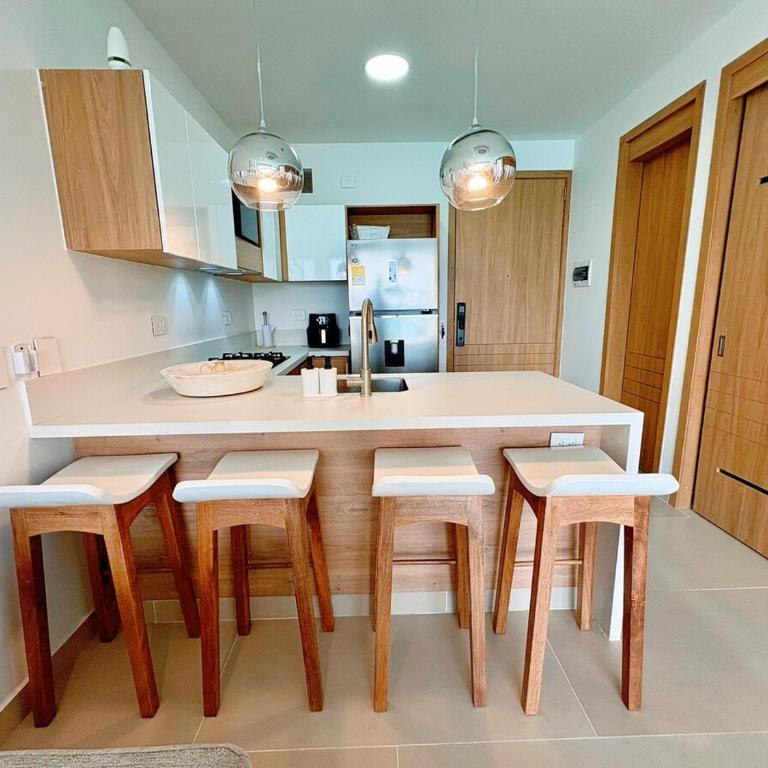 Tu café de la mañana con vista a la laguna - Two-Bedroom Apartment - 21