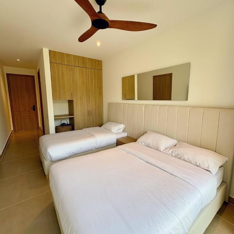 Tu próximo destino favorito, directo a tu comodidad - Two-Bedroom Apartment - 13