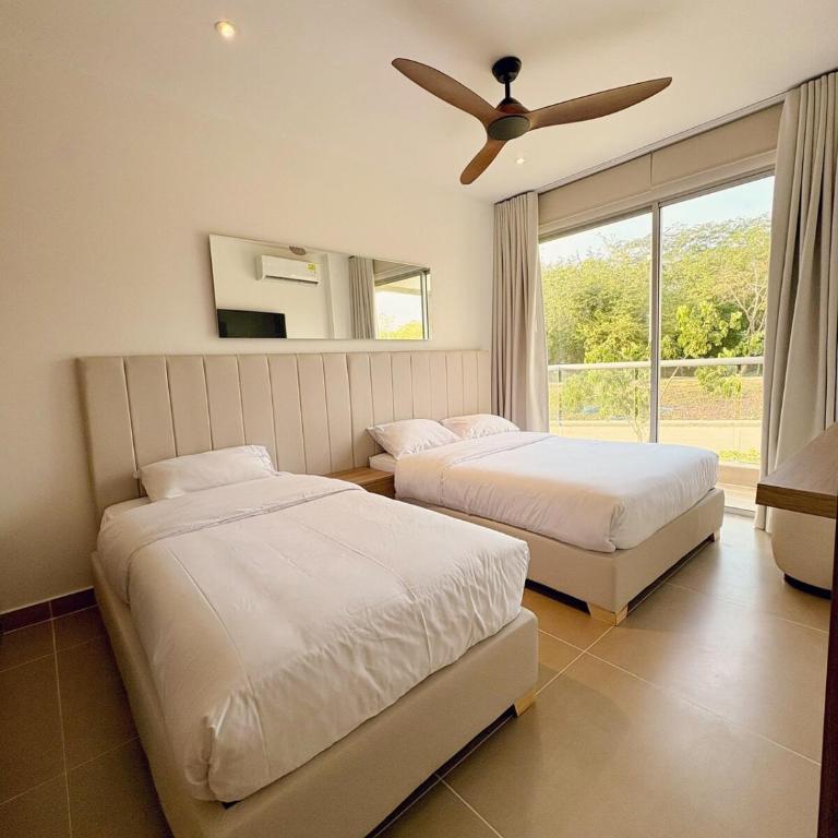 Tu próximo destino favorito, directo a tu comodidad - Two-Bedroom Apartment - 26