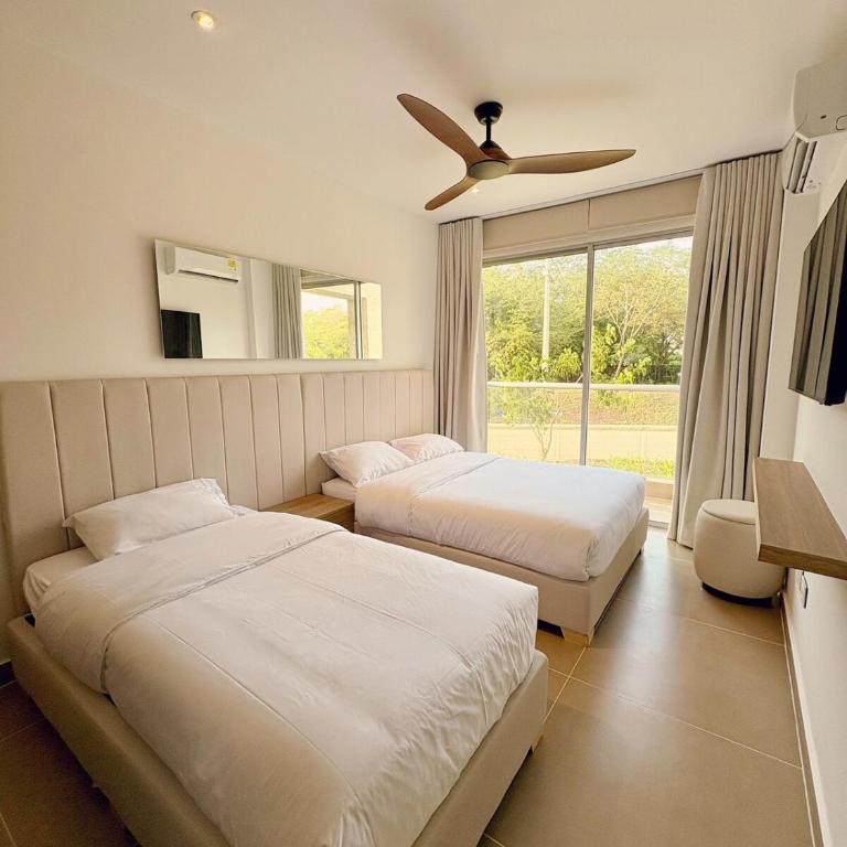Tu próximo destino favorito, directo a tu comodidad - Two-Bedroom Apartment - 31