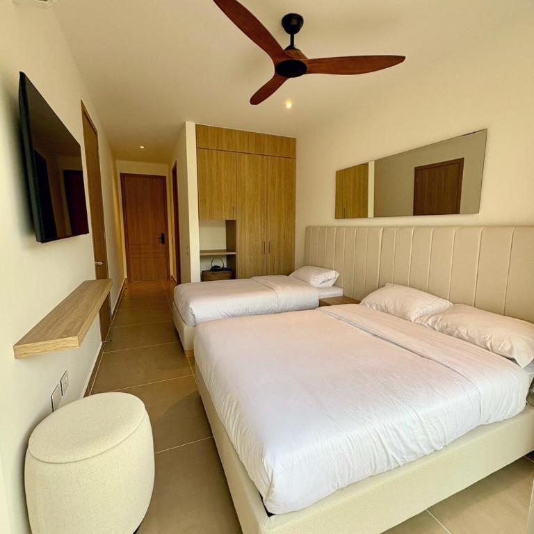 Tu próximo destino favorito, directo a tu comodidad - Two-Bedroom Apartment - 32