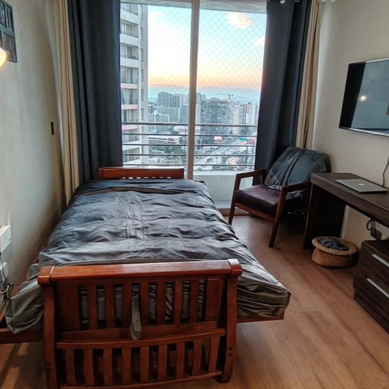 Depto Familiar con estacionamiento y a pasos del metro - Apartamento de 2 dormitorios - 32