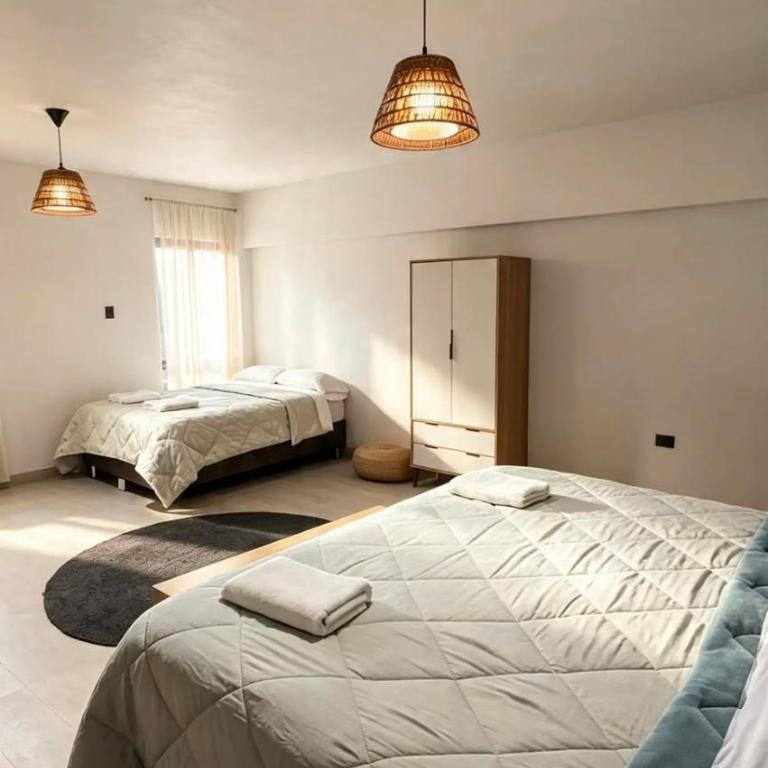 LA SIESTA Suites - Habitación con cama extragrande y vistas al mar - 7
