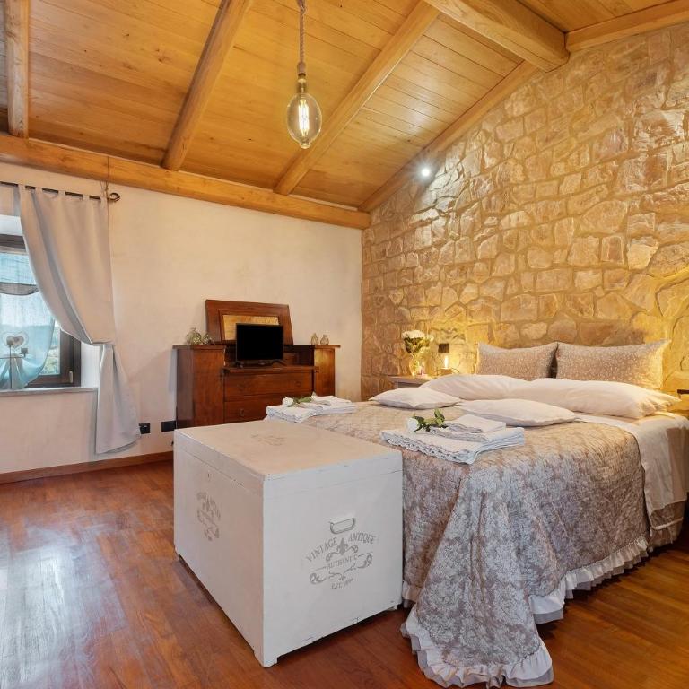 Tra gli ulivi e il panorama - Deluxe-Apartment mit 2 Schlafzimmern und Gartenblick - 1