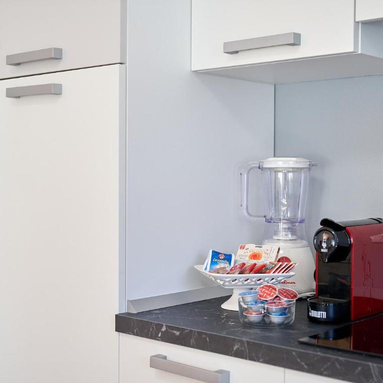 Dolomis Apartments - Appartamento Deluxe con 2 Camere da Letto e Vista Giardino - 5