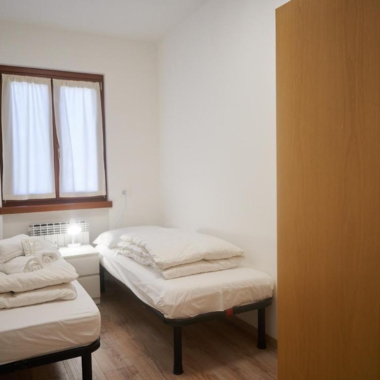 Dolomis Apartments - Appartamento Deluxe con 2 Camere da Letto e Vista Giardino - 9