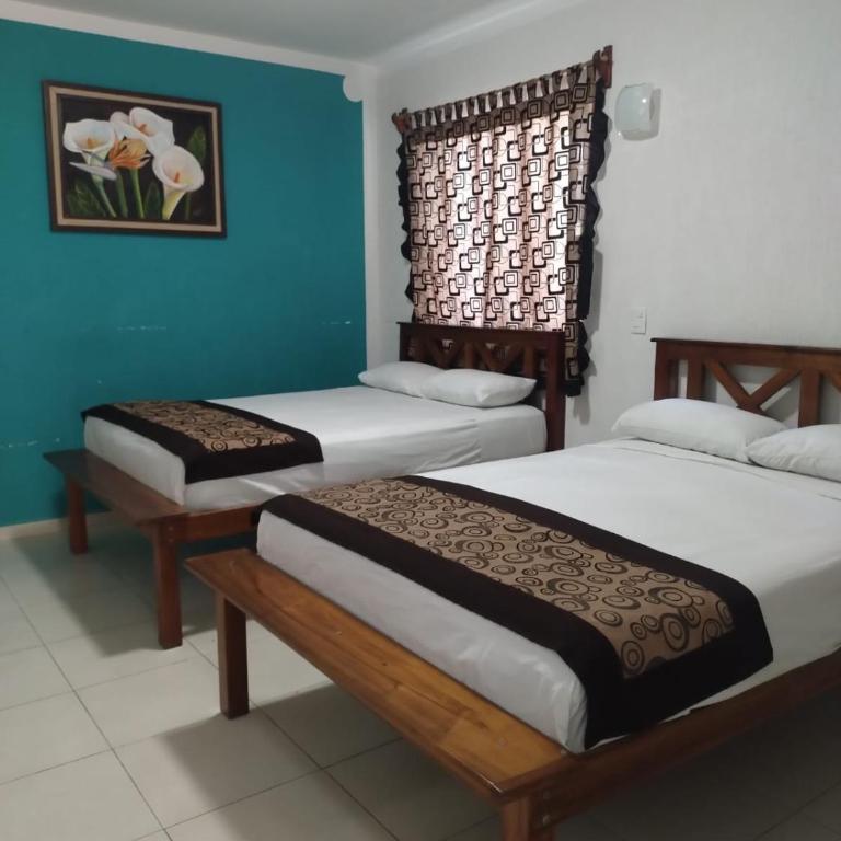Hotel Las Palmas en Laurel - Habitación cuádruple - 12