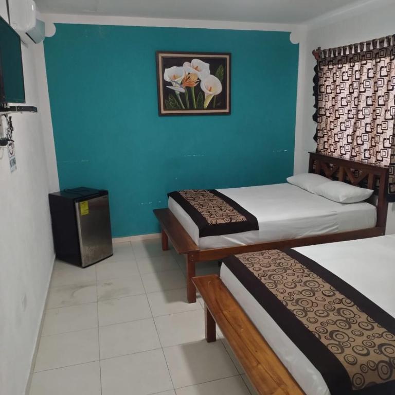 Hotel Las Palmas en Laurel - Habitación cuádruple - 8