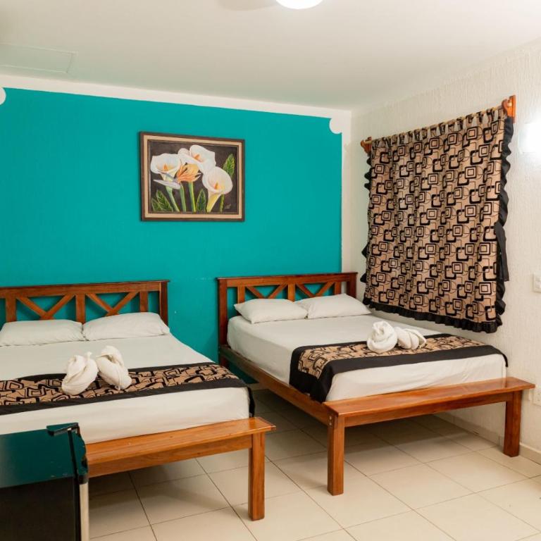 Hotel Las Palmas en Laurel - Habitación cuádruple - 7