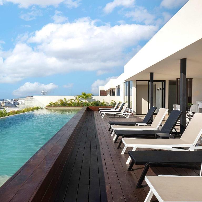 Rooftop Pool & Stylish Retreat in Playa del Carmen - Apartamento - 10