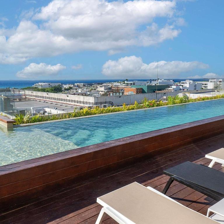 Rooftop Pool & Stylish Retreat in Playa del Carmen - Apartamento - 16