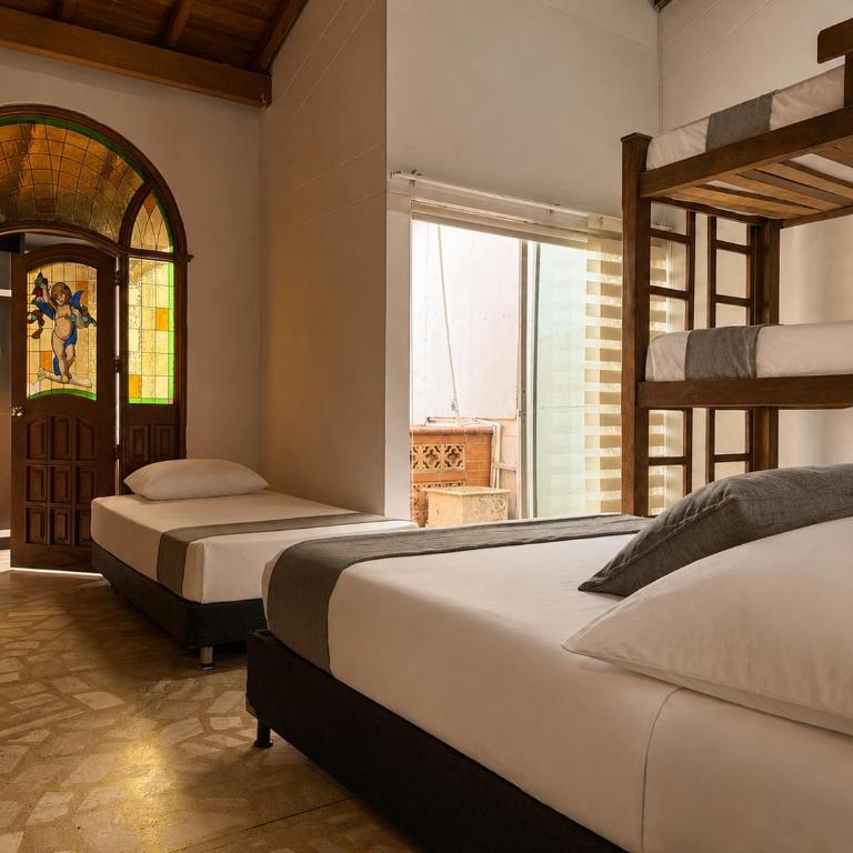 Hotel Boutique Laureles Home - Family Room - 1