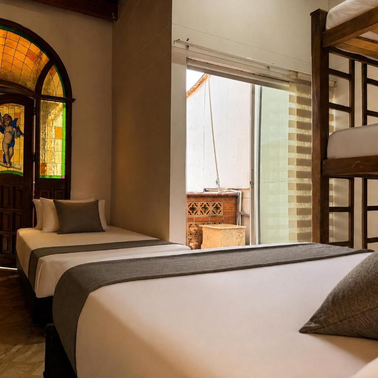 Hotel Boutique Laureles Home - Family Room - 17
