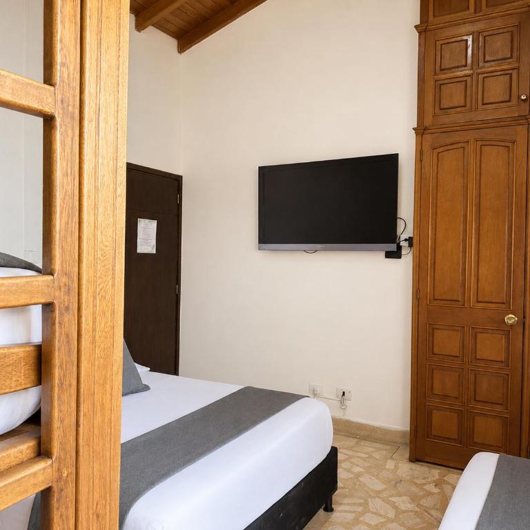 Hotel Boutique Laureles Home - Family Room - 10