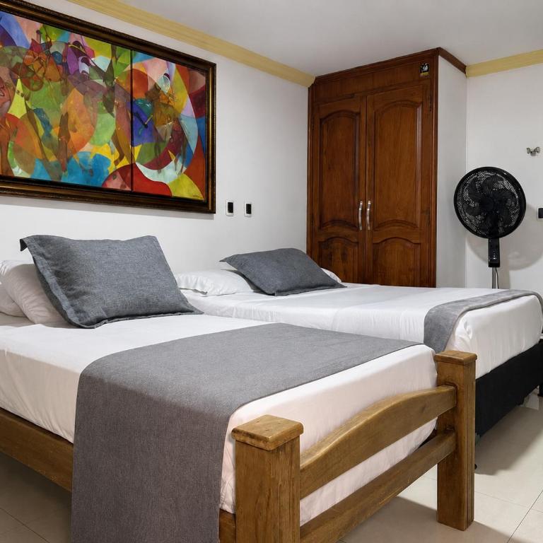 Hotel Boutique Laureles Home - Family Room - 22