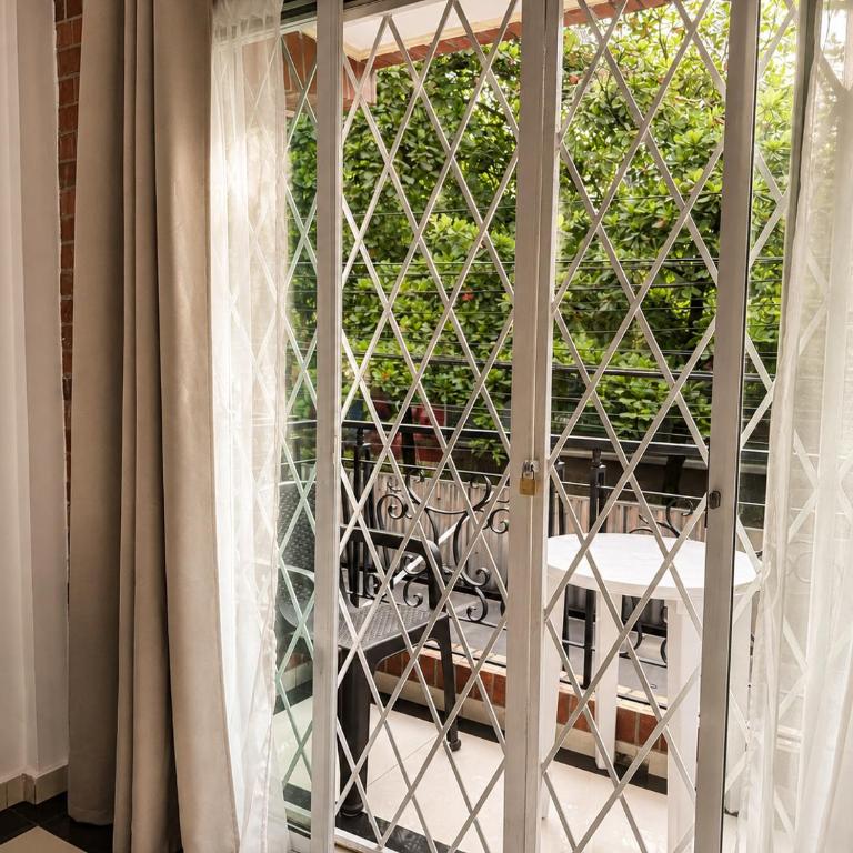 Hotel Boutique Laureles Home - Deluxe Double Room - 1