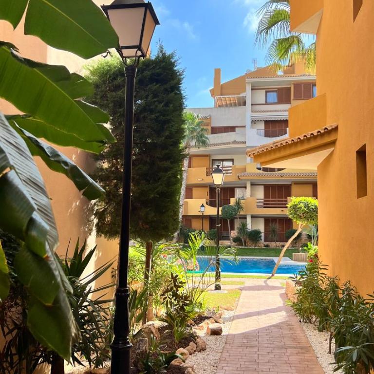 Punta Prima - Charming Spanish Apartment with South-Facing Terrace by the Sea - Two-Bedroom Apartment - 1
