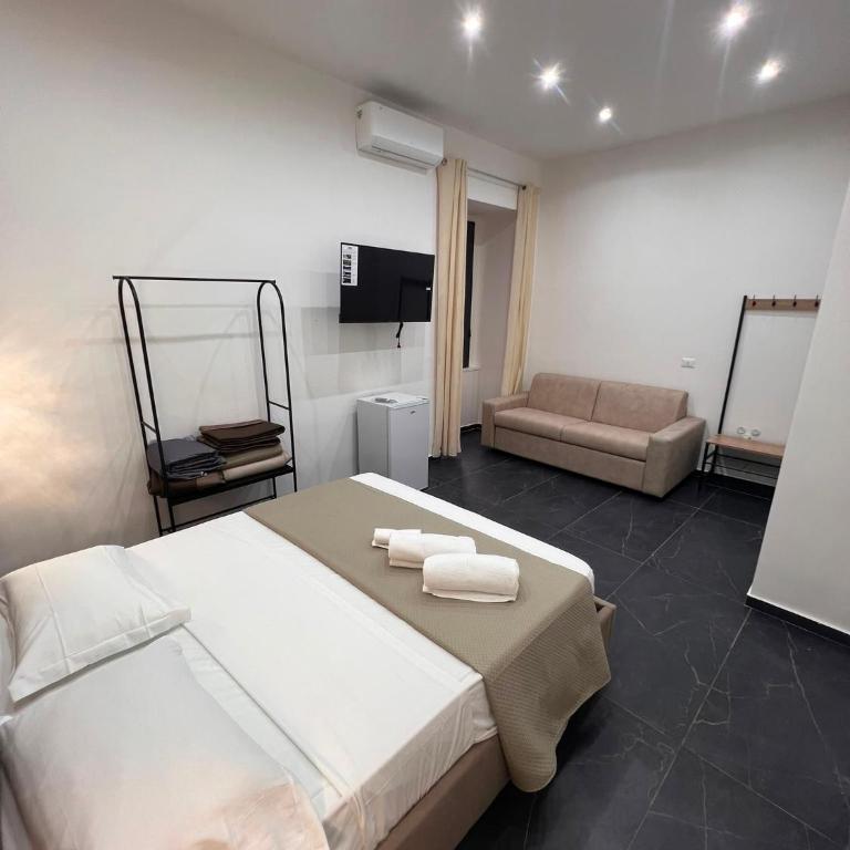 Valentino station 32 - Quadruple Room - 1