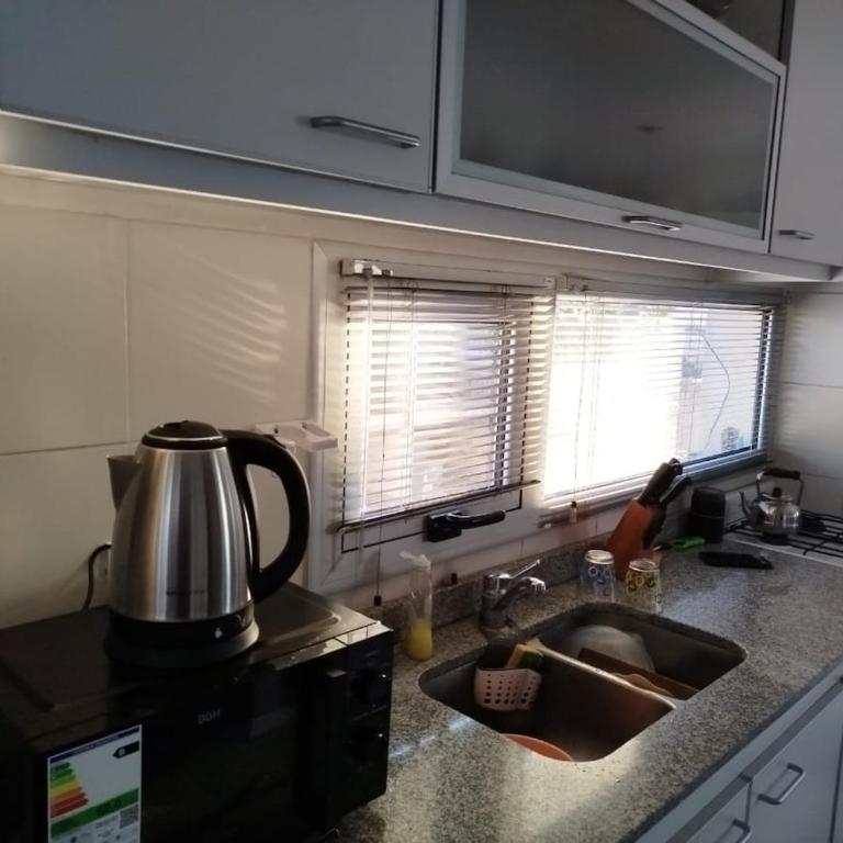 Departamento con Terraza, Parrilla y Fácil Acceso - Apartamento de 1 dormitorio - 21