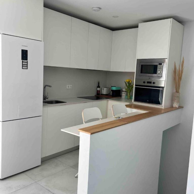 A duplex penthouse with a terrace and a parking space - Apartamento de 2 dormitorios con vistas al complejo - 11