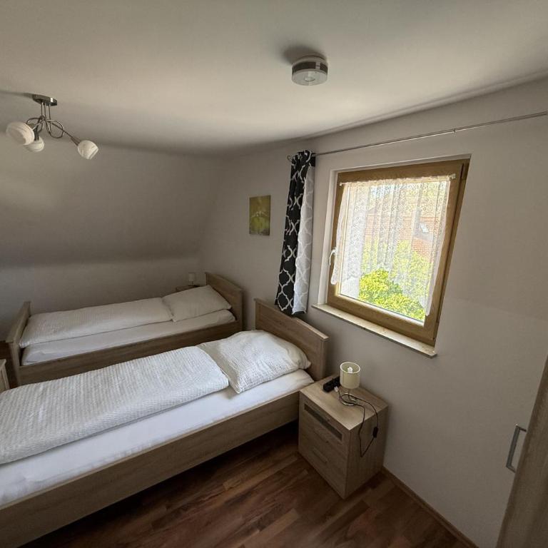 Gästehaus - Lindengarten - Doppelzimmer mit Gemeinschaftsbad - 1