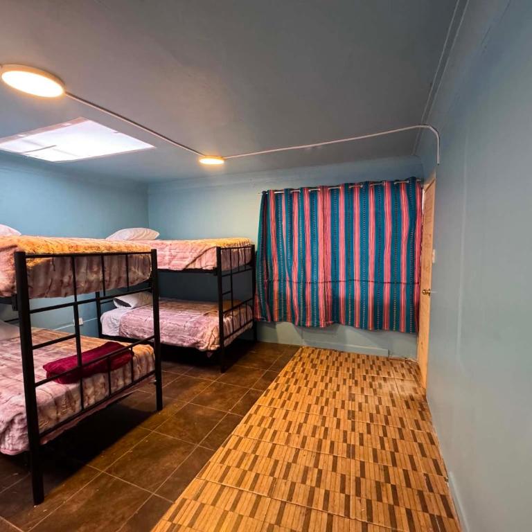 AMARU'S INN HOSTEL's - Bed in 8-Bed Dormitory Room - 1