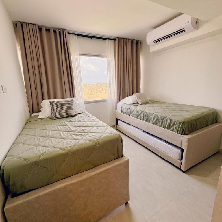 Amplio apartamento familiar con piscina en Serena del Mar - Two-Bedroom Apartment - 19