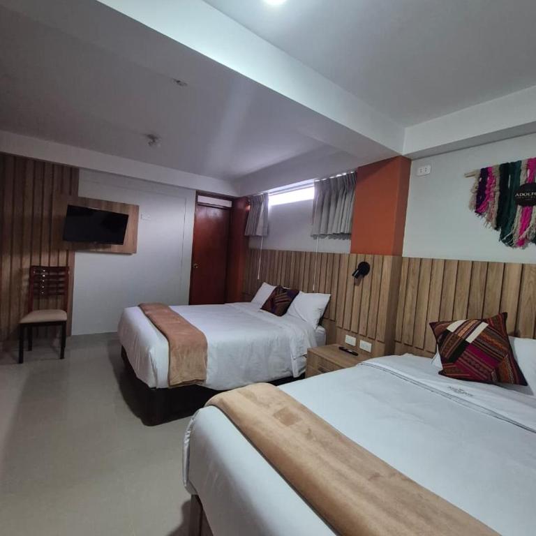 Hotel Adolfo's - Comfort Quadruple Room - 1