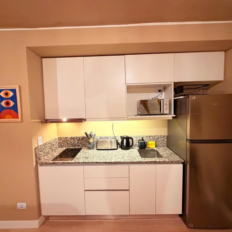 Studio moderno con mural - King Size bed - Apartamento de 1 dormitorio - 13