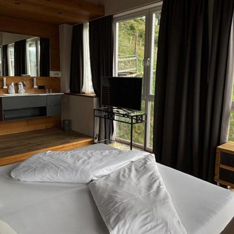 MY ALPENWELT Resort 4 Sterne Superior - Suite mit 3 Schlafzimmern - 14