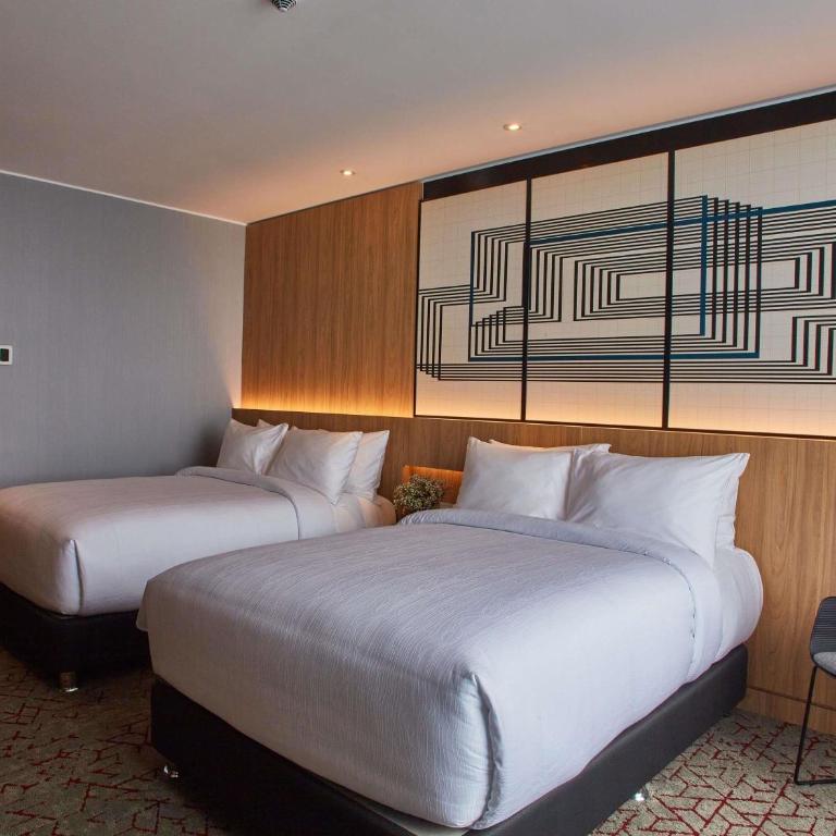 Pullman Lima Miraflores - Habitación Doble Deluxe - 2 camas dobles - 1