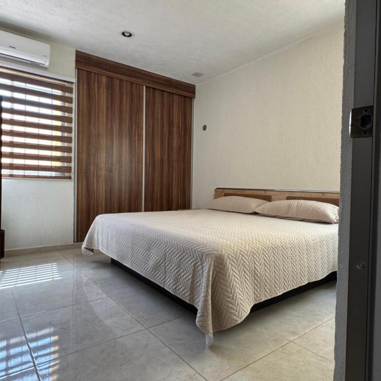 Bonita Casa Vacacional. Punto medio entre ciudad y playa - Casa Unifamiliar de 2 dormitorios - 14