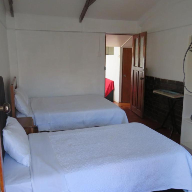 Hospedaje Apu San Isidro - Family Room with Private Bathroom - 9