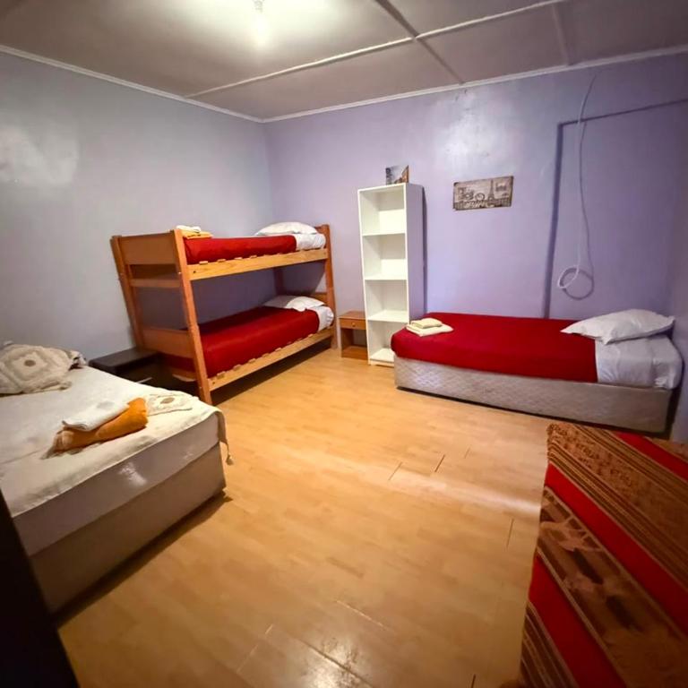 Hostal Nuevo Sol y Viento - Habitación Familiar con baño - 1